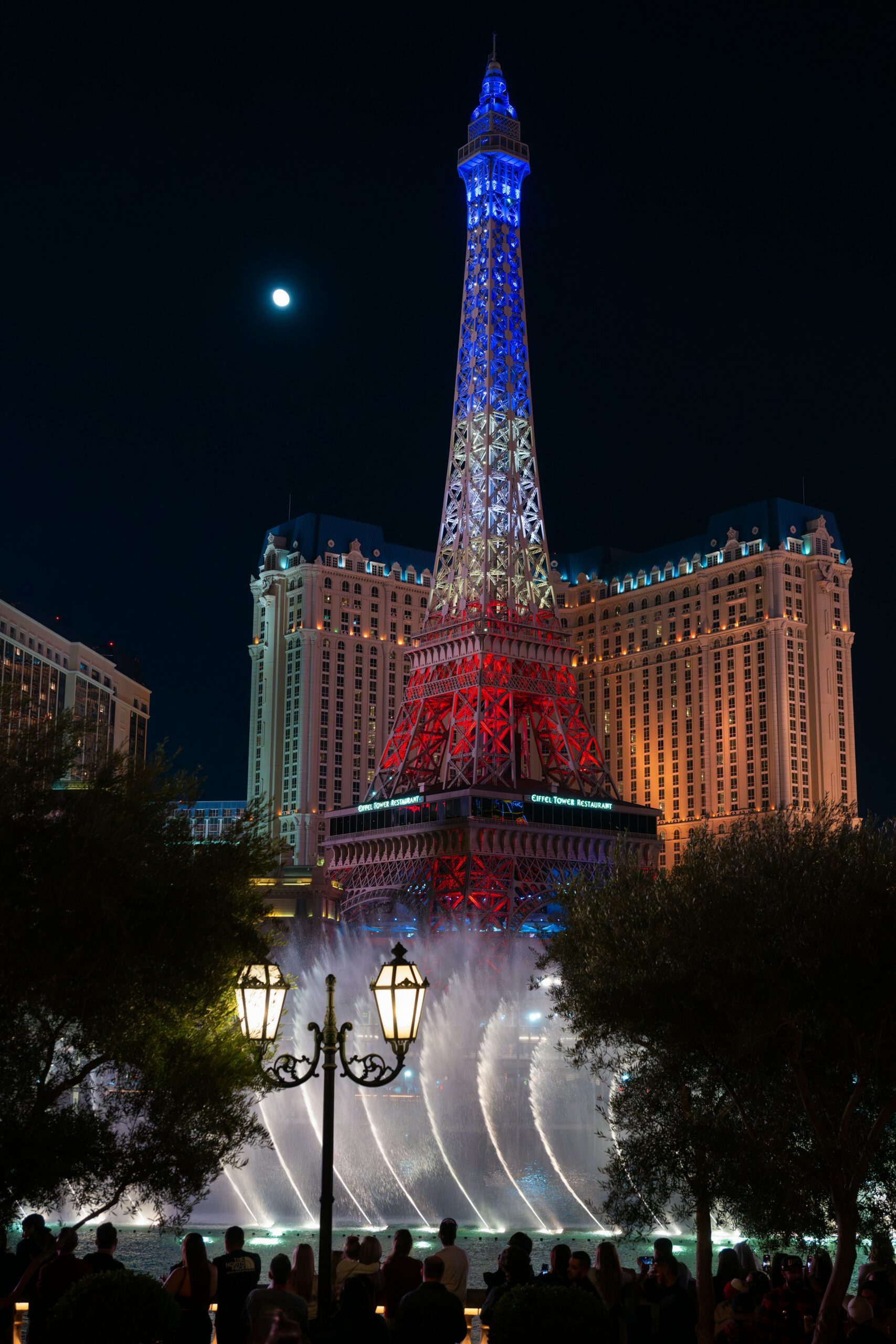 Paris Las Vegas Eiffel Tower lit up at night on the Strip